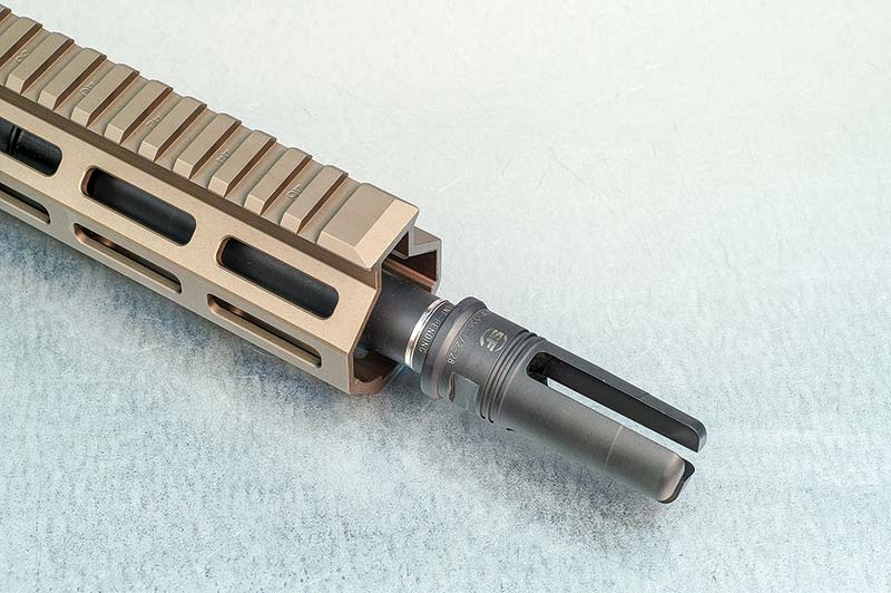 SureFire SOCOM flash hider "permanently" attached giving 16"...