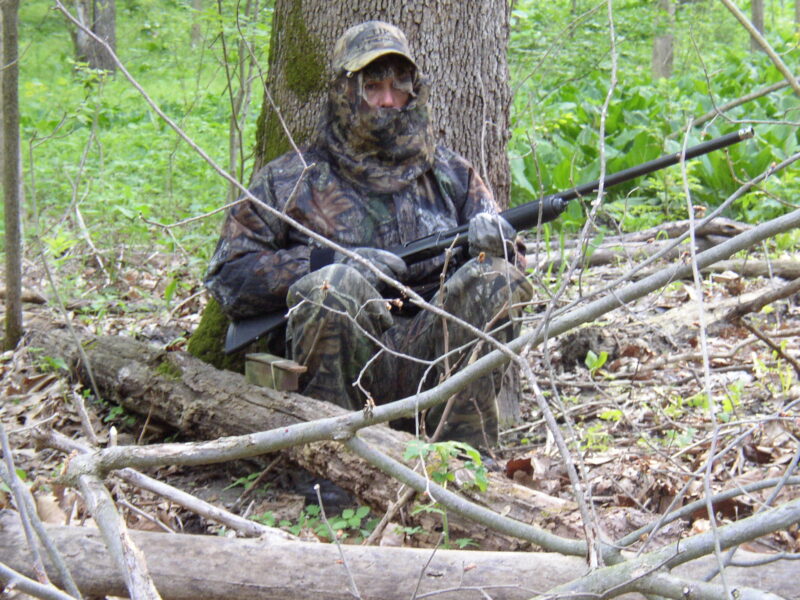This hunter is waiting for a turkey but he could also be suffering from Tingle-Butt, Mystery Hand or many other hunting-related ailments. Read the story and find out the symptoms!
