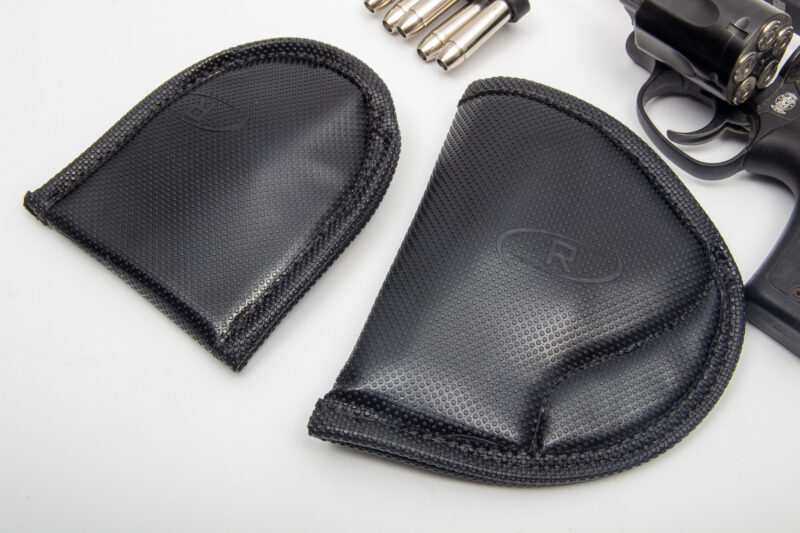 The Remora inside-the-waistband 8CH holster (right) and MH-1 non-slip pouch. Remora gear is made with an amazing highly-tactile outer material to keep them anchored in your waistband without clips, hooks, rivets, heavy-duty welds or an act of Congress!
